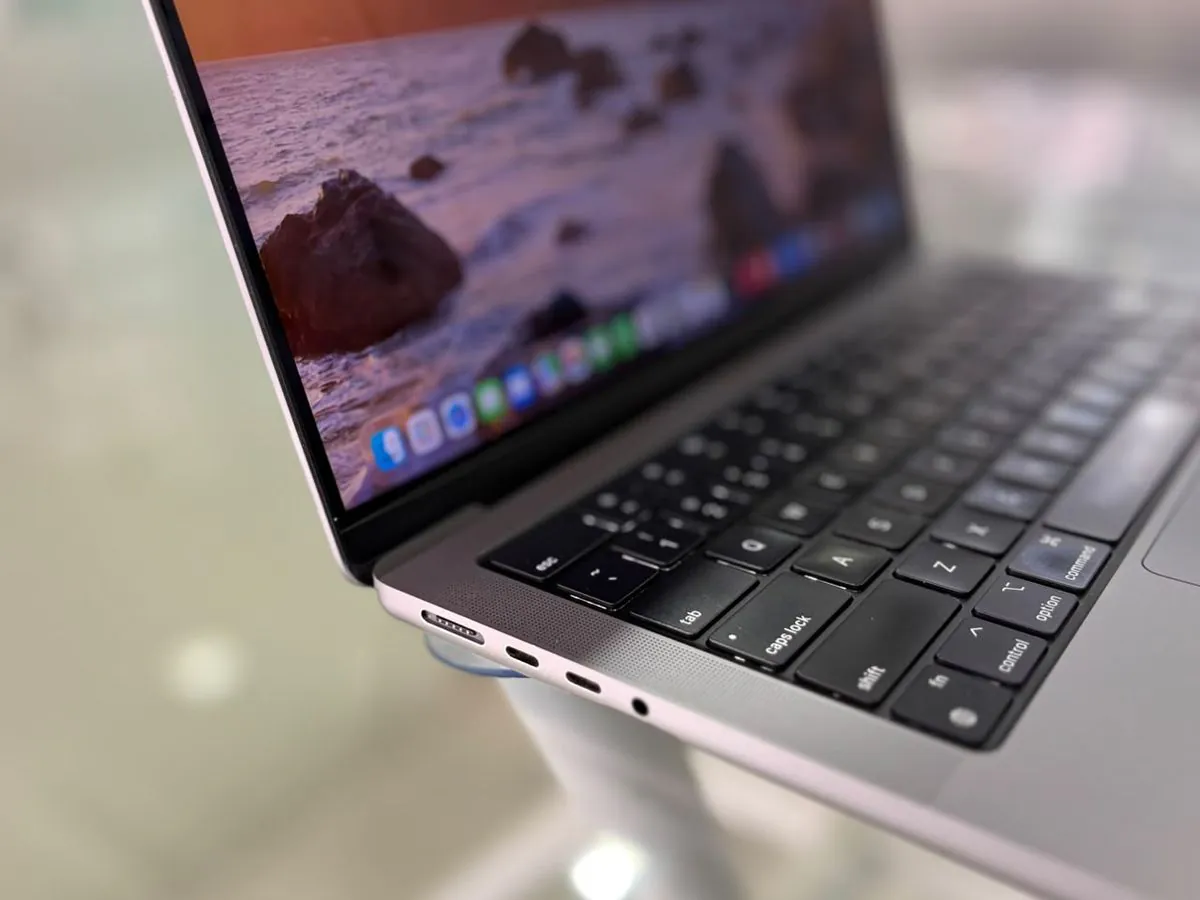 MacBook Pro 14-inch M1 Pro left side close-up showing the MagSafe 3 port, two Thunderbolt 4 (USB-C) ports and the 3.5 mm headphone jack