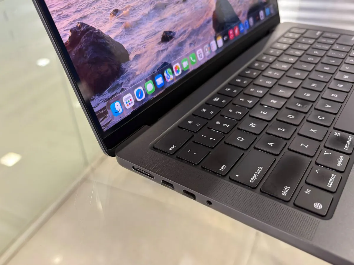 MacBook Pro 14-inch M3 Pro left side close-up showing the MagSafe 3 port, two Thunderbolt 4 (USB-C) ports and the 3.5 mm headphone jack