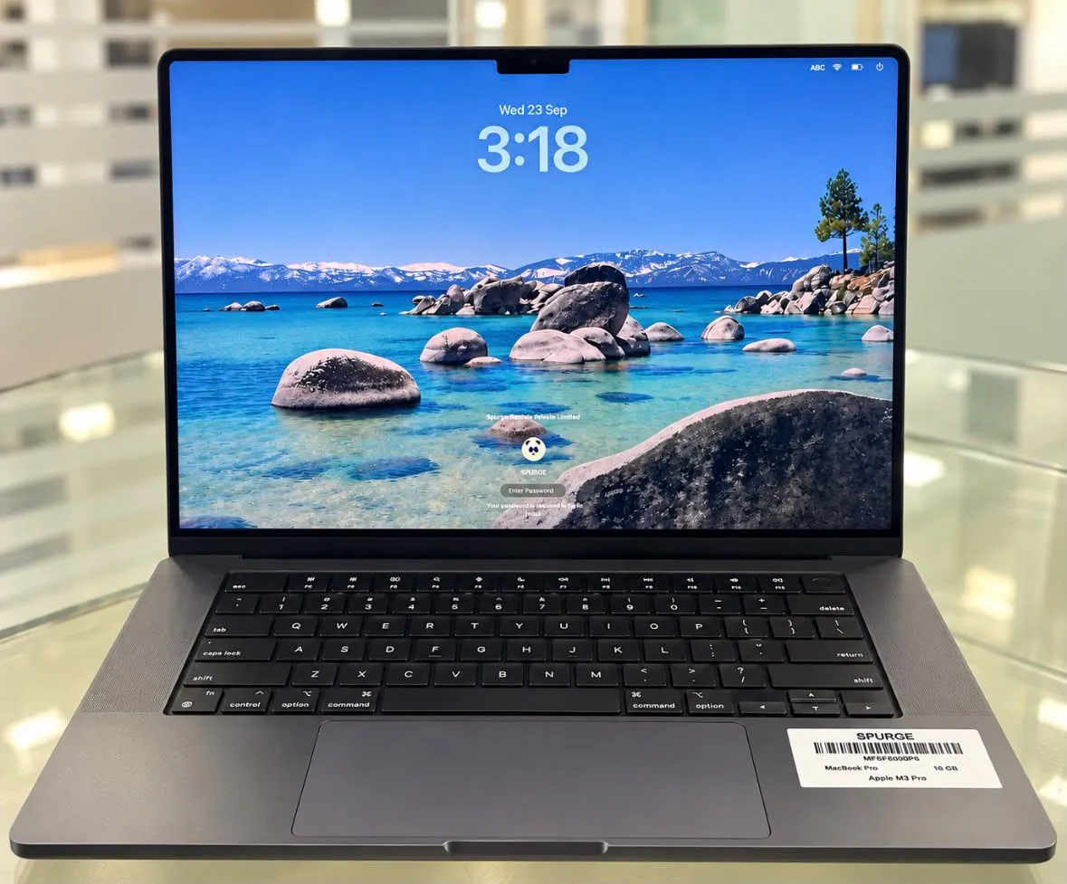 MacBook Pro 16-inch M3 Pro in Space Black, open facing the camera, showing the display, keyboard, trackpad and Touch ID key