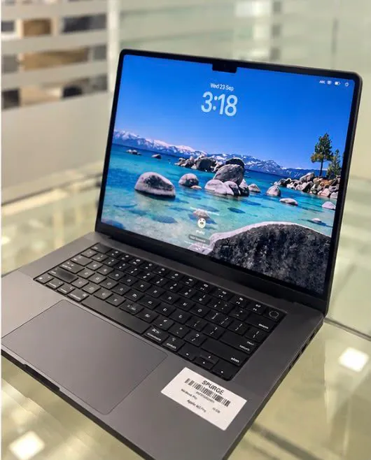 MacBook Pro 16-inch M3 Pro from a left three-quarter angle with the display on