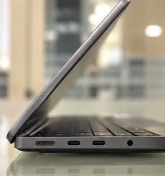 MacBook Pro 16-inch M3 Pro left side showing the MagSafe port, two USB-C/Thunderbolt ports and the headphone jack