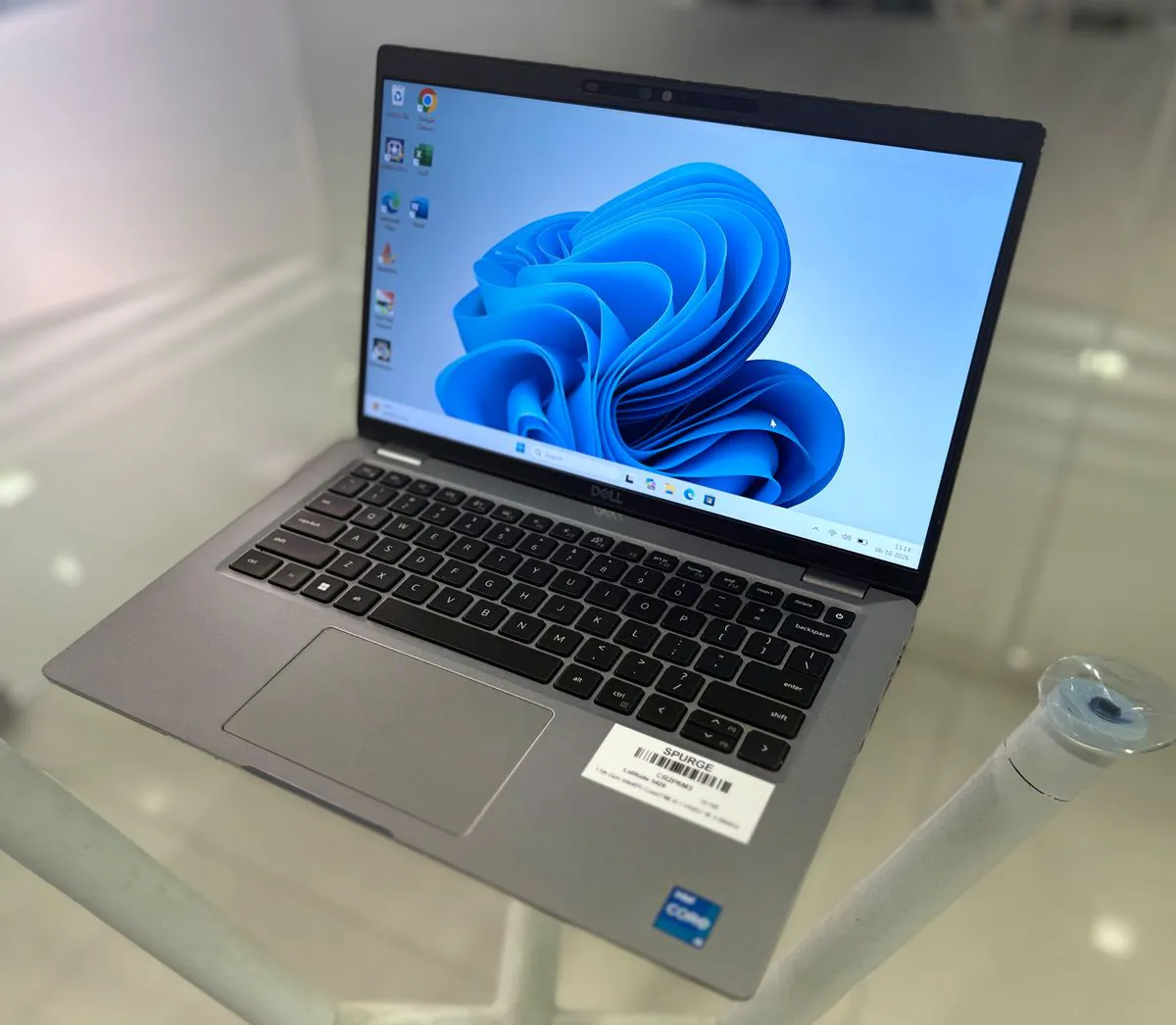 Dell Latitude 5420, open, three-quarter view from the right showing the display, keyboard, power button and trackpad