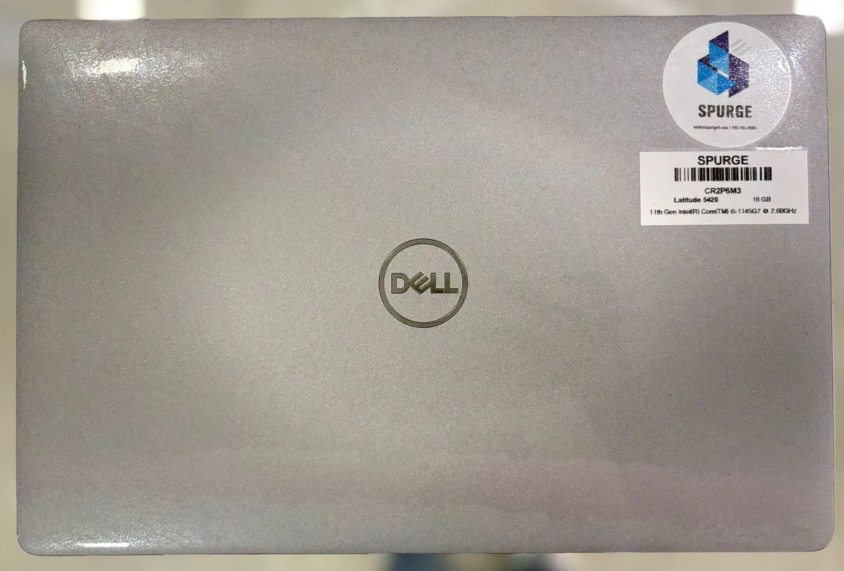 Dell Latitude 5420 closed, grey lid with the Dell logo and SPURGE asset stickers