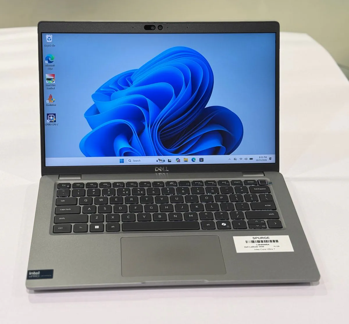 Dell Latitude 5450, open front view showing the display, keyboard and trackpad.