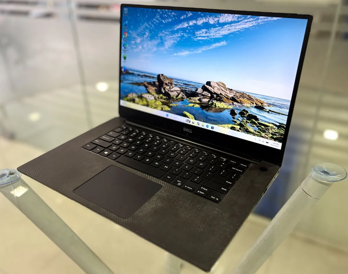 Dell Precision 5530, open, three-quarter view from the right showing the display, keyboard, power button and trackpad