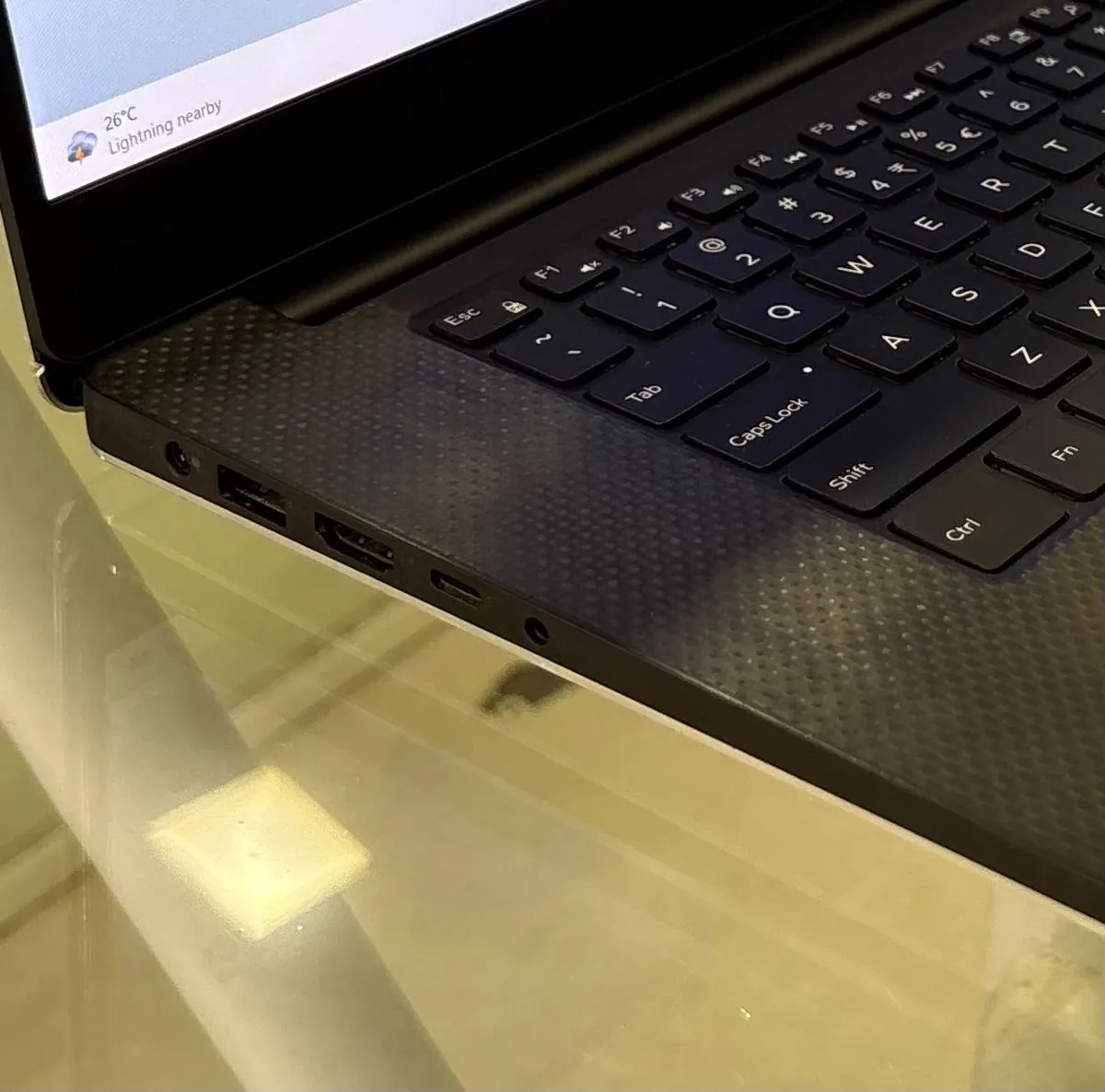 Dell XPS 15 9570 left side showing the power port, a USB-A port, HDMI, a Thunderbolt 3 USB-C port and the headset jack