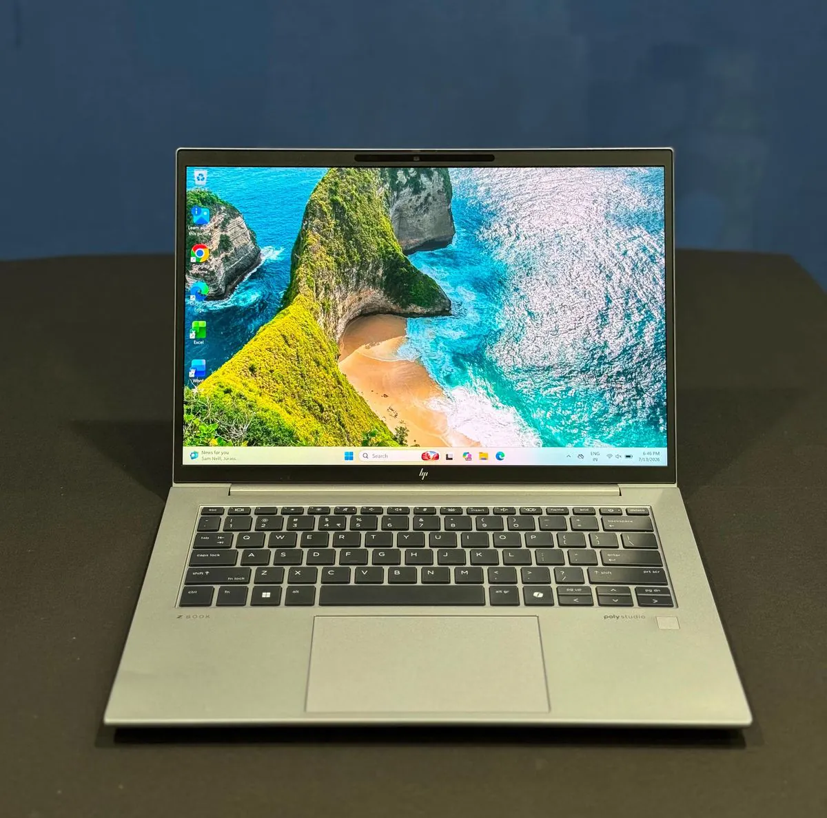 HP ZBook Firefly 14 G11 A open facing the camera, showing the 14-inch display, keyboard, touchpad and fingerprint reader