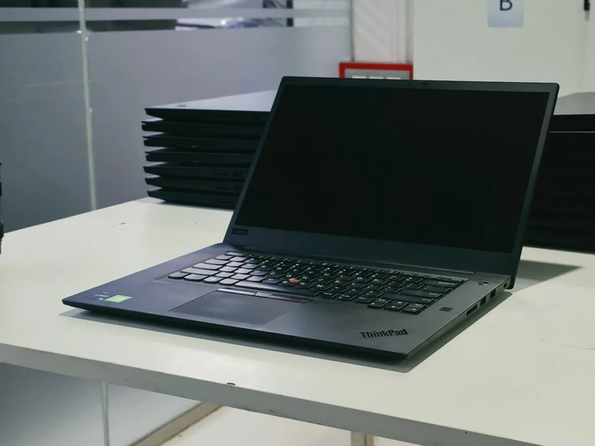 Lenovo ThinkPad P1 Gen 3 from the right side showing two USB-A ports, the side power button and the security slot
