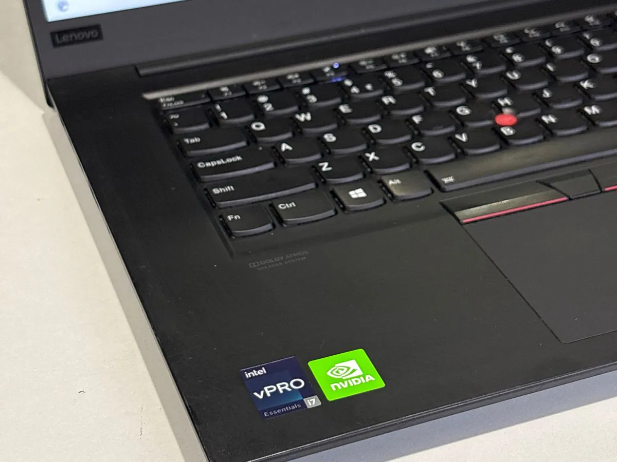 Close-up of the ThinkPad P1 Gen 3 keyboard deck with TrackPoint, backlit keys and Intel vPro Core i7 and NVIDIA stickers